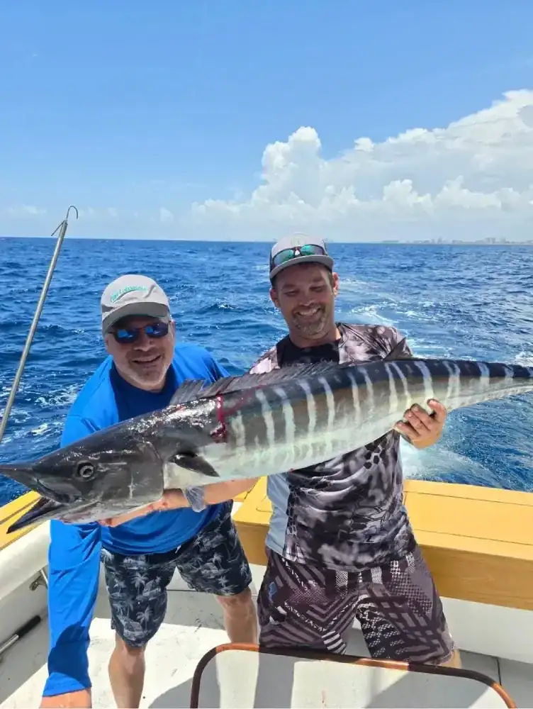 Fishing charter guests from Coconut Creek, FL aboard Don't Panic