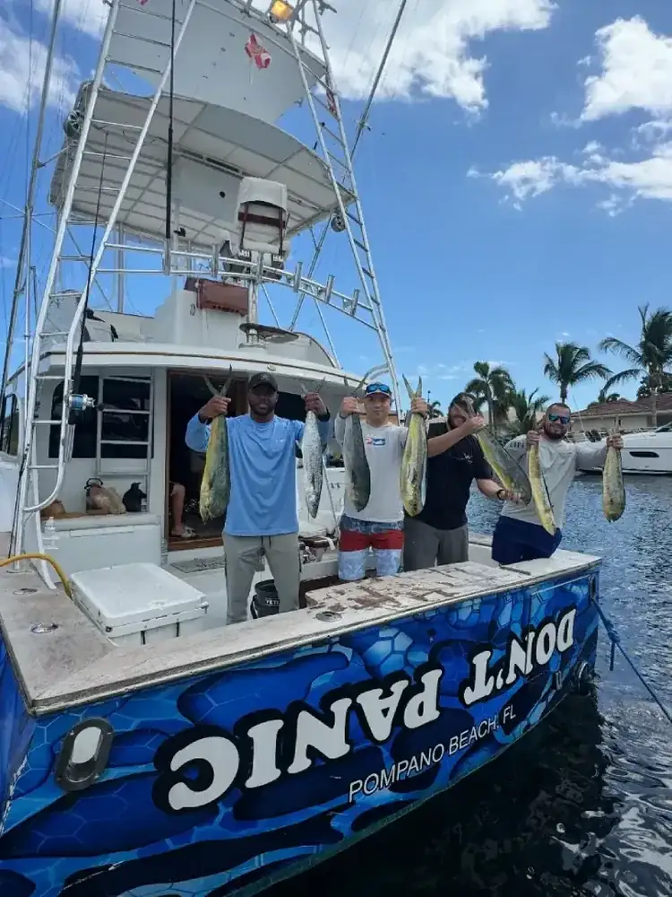 Anglers from Coral Springs, FL with their catch aboard Don't Panic out of Pompano Beach