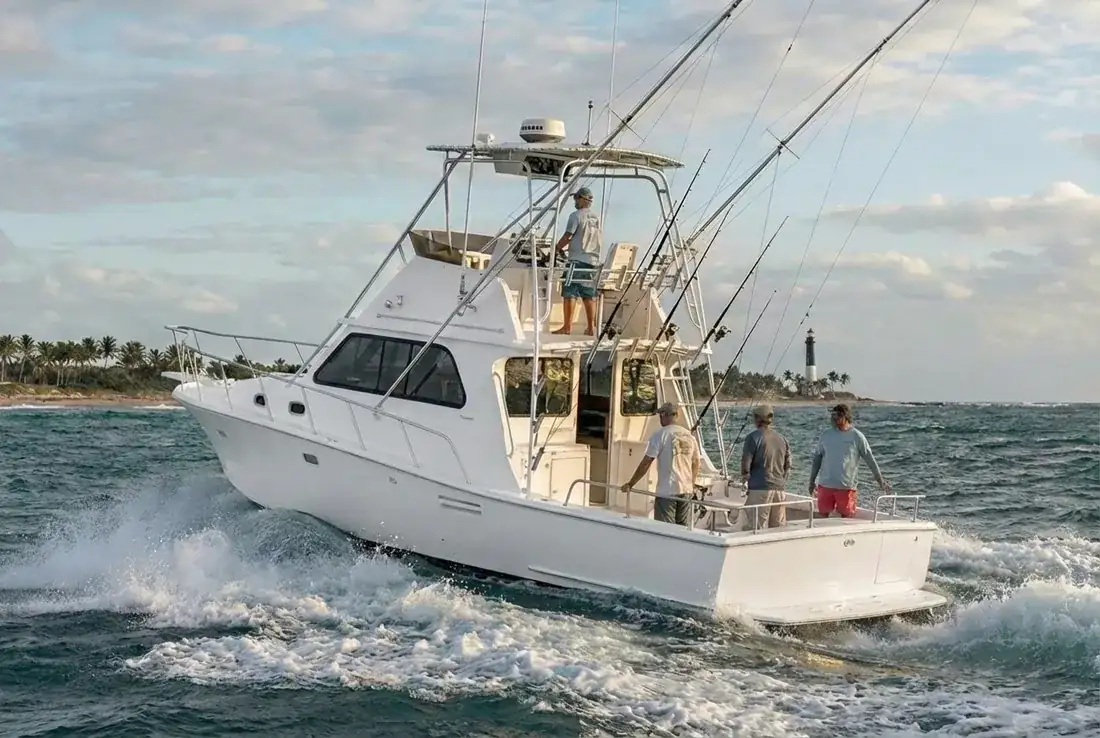 Deep-V sportfishing boat cutting through choppy Atlantic seas off Pompano Beach