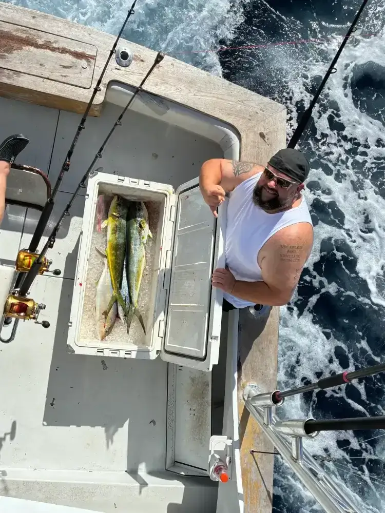 Anglers with their offshore catch on a Coral Springs fishing charter - Don't Panic Sportfishing