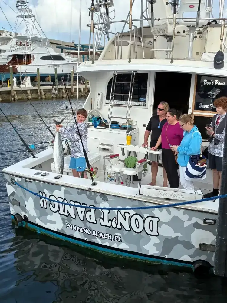 Anglers with their offshore catch on a Davie fishing charter - Don't Panic Sportfishing