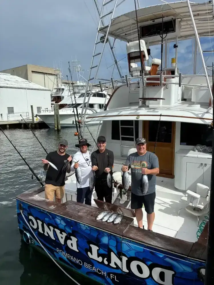 Anglers with their offshore catch on a Fort Lauderdale fishing charter - Don't Panic Sportfishing