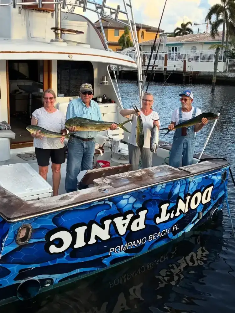 Anglers with their offshore catch on a Lauderdale Lakes fishing charter - Don't Panic Sportfishing