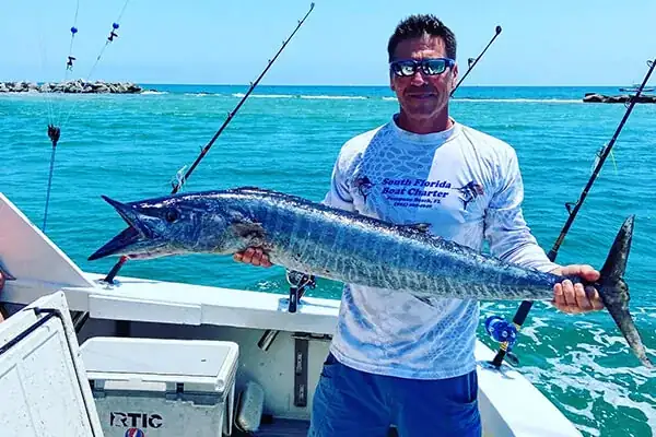 Captain Ron, owner of Don't Panic Sportfishing, with a wahoo off Pompano Beach